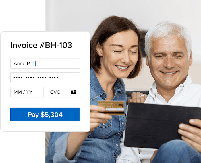 Business owner celebrating a paid invoice